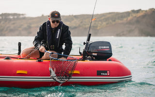 Fishing from a True Kit Discovery landing craft inflatable catamaran