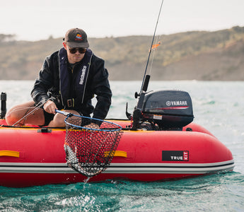 Fishing from a True Kit Discovery landing craft inflatable catamaran