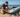 A man fixing his inflatable dinghy