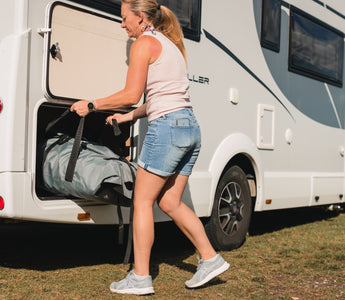 The compact True Kit inflatable coming out of a motorhome/RV