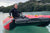 Inflatable catamaran landing craft with bridle bow handle